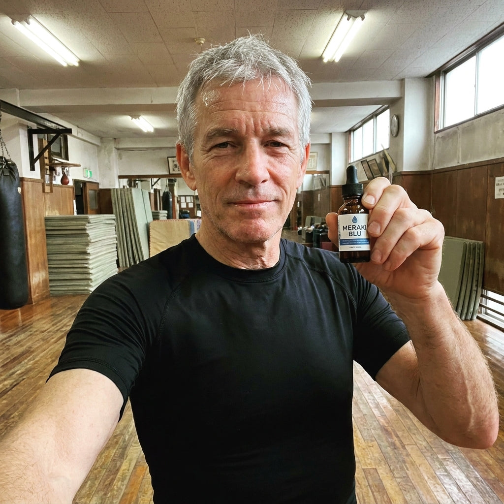 Evon in a martial arts dojo with Meraki Blu